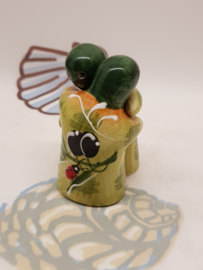 Salz- und Pfefferstreuer begrüßen Menschen Grün