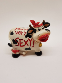 Sexy cow as a piggy bank