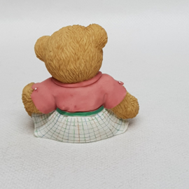 A mother gives 112454 Cherished Teddies