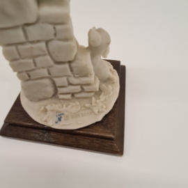 A Belcari beeld jongen met hondje