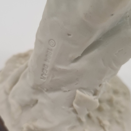 A Belcari statue of a boy with a fruit basket