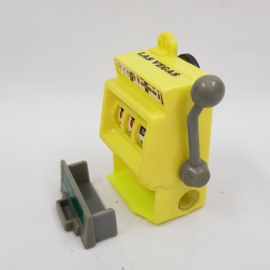 Pencil sharpener and fridge magnet in the form of a slot machine