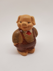 Terracotta piggy bank male in brown pants