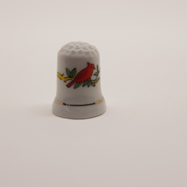 Thimble with red bird