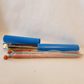 Knitting needles in plastic retro blue tube