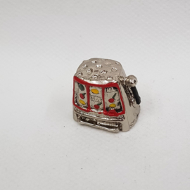Metal thimble in the shape of a slot machine