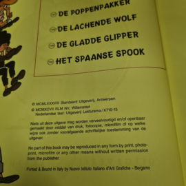 Suske en Wiske comic book including the doll packer