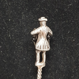 Antique silver plated sugar spoon with a man on top