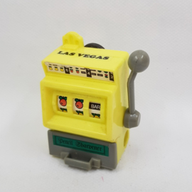 Bleistiftspitzer und Kühlschrankmagnet in Form eines Spielautomaten
