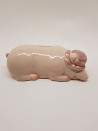 Sleeping pig porcelain piggy bank