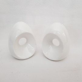 Porzellanringe wie Pfeffer und Salz