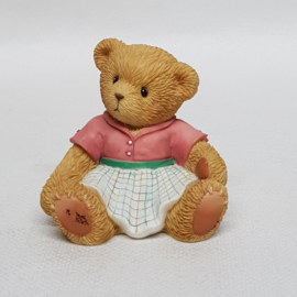 A mother gives 112454 Cherished Teddies