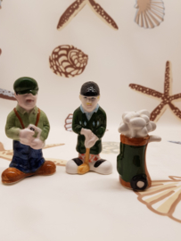 Salt and Pepper Golfing people with golf bags