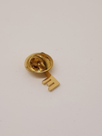 Gold-colored pin V and a kind of key