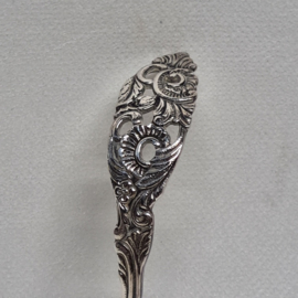 Silver plated tea strainer in spoon shape