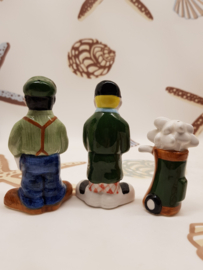 Salt and Pepper Golfing people with golf bags