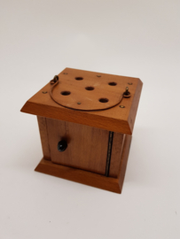 Wooden stove as a piggy bank