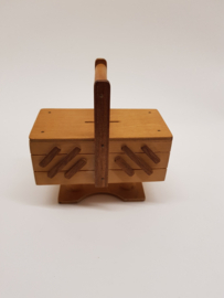 Wooden sewing box as a money box