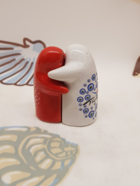 Salz- und Pfefferstreuer begrüßen Menschen