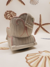 Spieluhrkatze im Schaukelstuhl