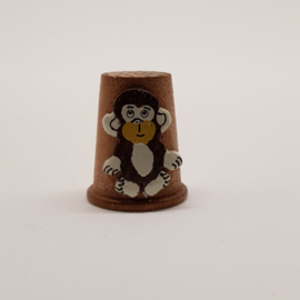Wooden thimble with monkey