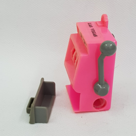 Puntenslijper en koelkast magneet in de vorm van een gokkastje