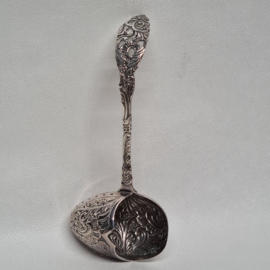 Silver plated tea strainer in spoon shape