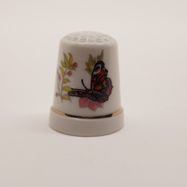 Thimble with a butterfly