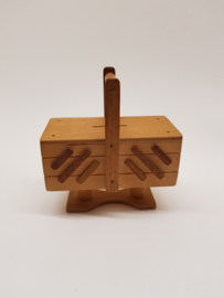Wooden sewing box as a money box