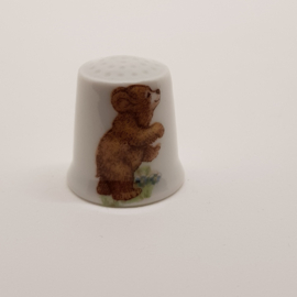 Thimble with a brown bear