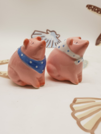 Schweine als Salz- und Pfefferstreuer