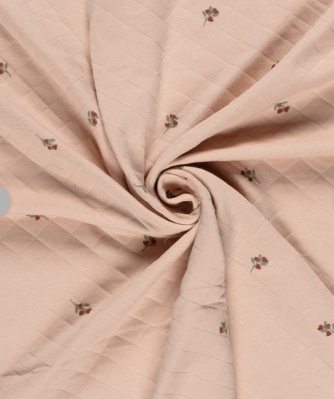 Tricot geweven stof Bloemen Zalm