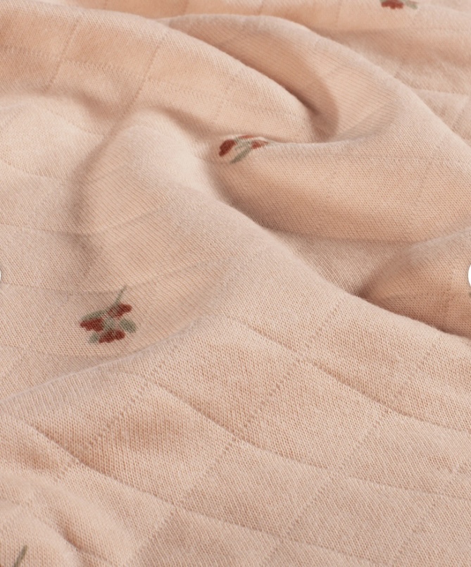 Tricot geweven stof Bloemen Zalm