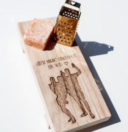 Plankje met silhouet en amberblokje