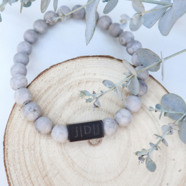 Gepersonaliseerde kralen armband voor heren van natuursteen met een RVS kraal