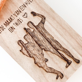 Plankje met silhouet en amberblokje