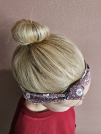 Knoophaarband mauve met bloemen