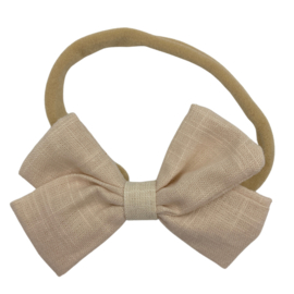 Babyhaarbandje met strik crème