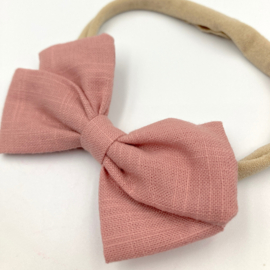 Babyhaarbandje met strik mauve