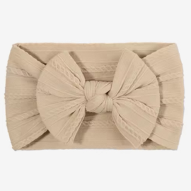 Babyhaarbandje met strik/knoop crème