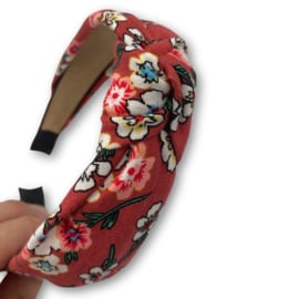 Knoophaarband roestrood met bloemen