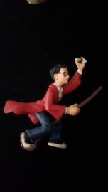 Harry Potter figuur met golden snitch