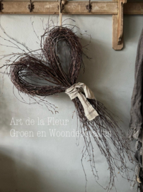 Berkenhart afgewerkt met bakkersdoek 60 a 65 cm