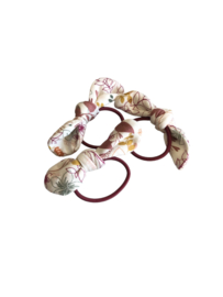 Haar elastiekje flower paars.