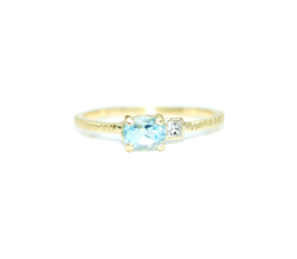 Verlovingsring in 18kt geel goud met blauwe topaas en princess cut diamant