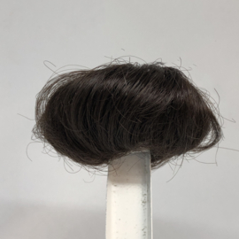 Poppen pruik kunsthaar omtrek 14  cm donkerbruin.
