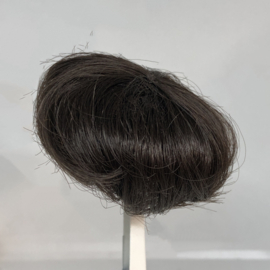 Poppen pruik kunsthaar omtrek 14  cm donkerbruin.