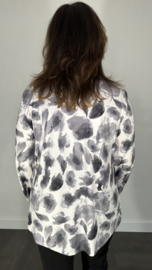 Stretch blouse travel furry spots grijs