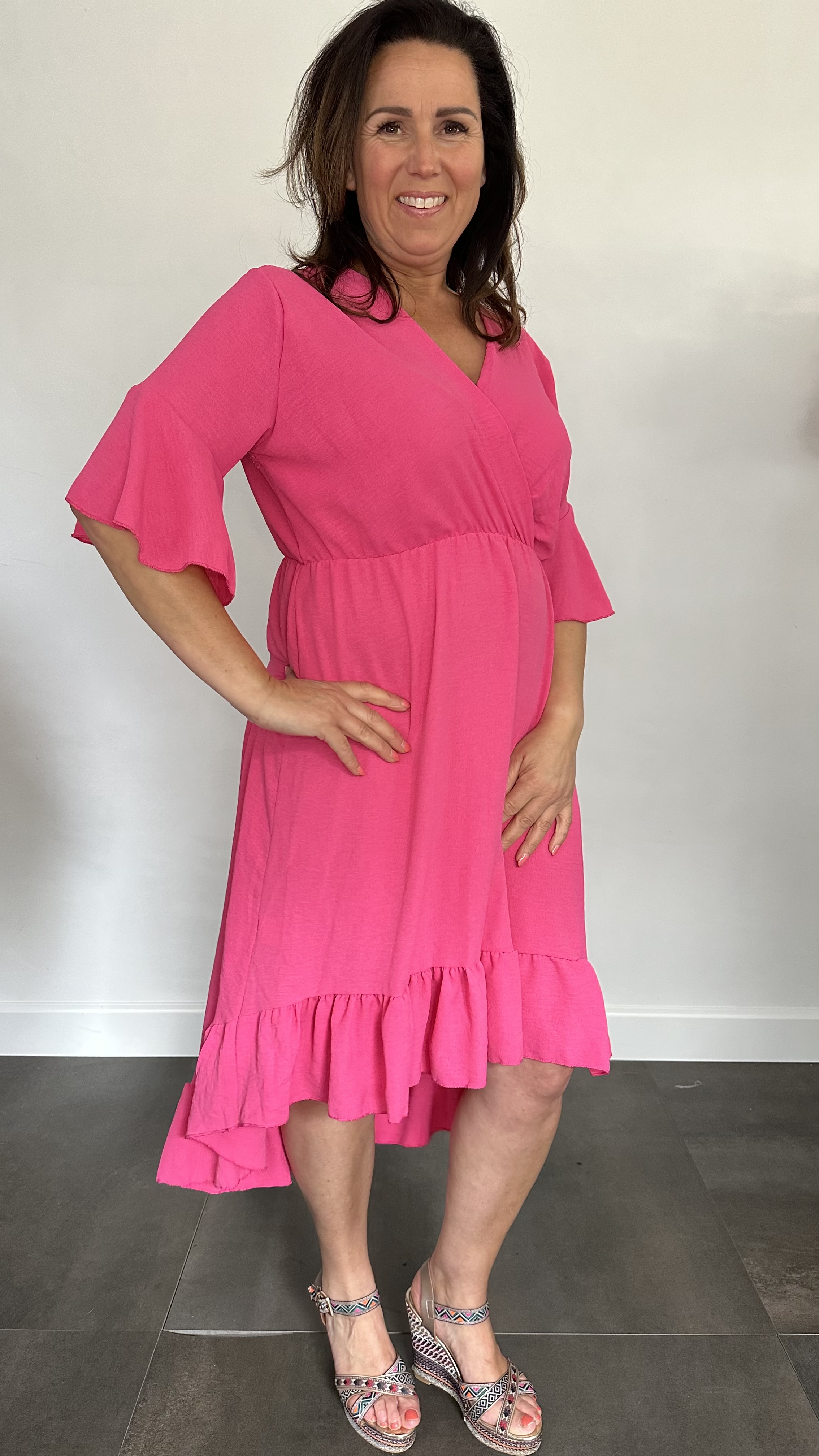 Jurk Aliya met ruche fuchsia