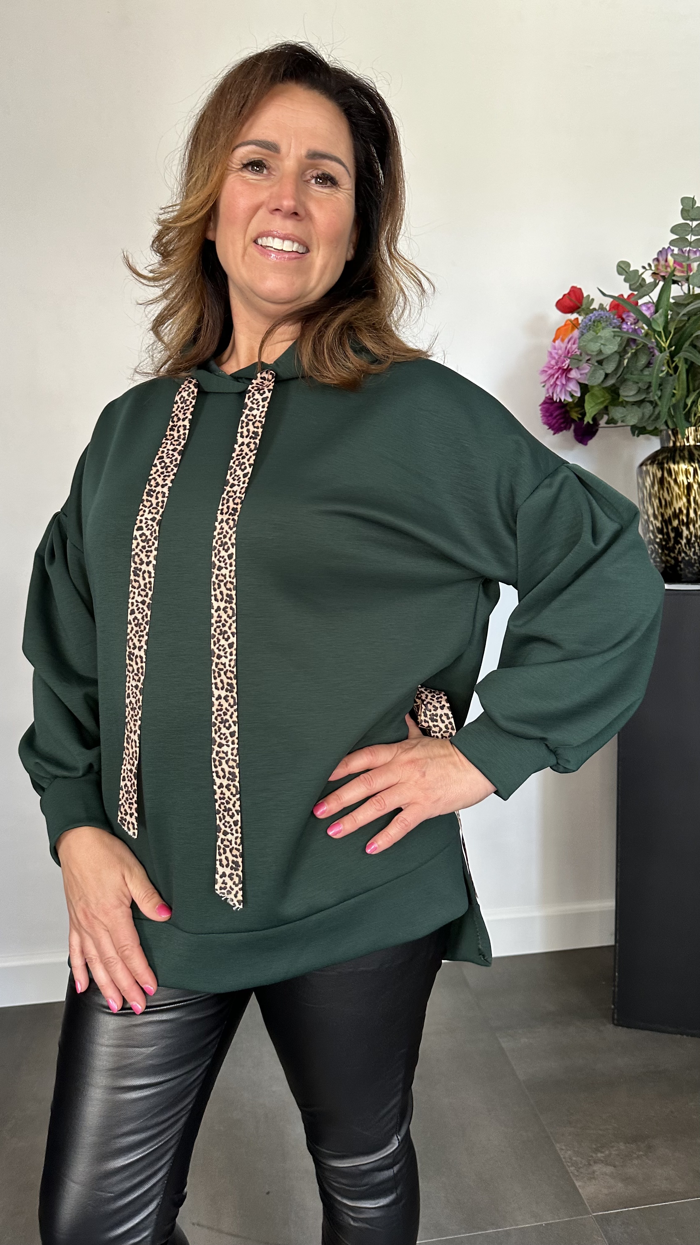 Sweater met capuchon en panter strikken flessen groen